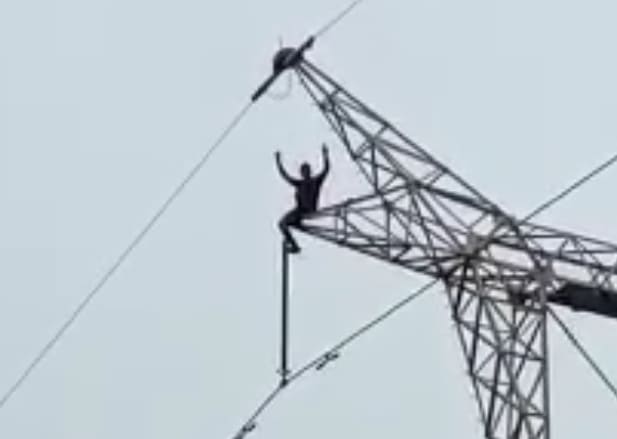 Mental Dude Gets Zapped After Climbing Transmission Tower