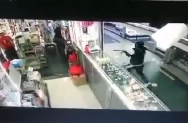 Hitman With Silenced Pistol Opens Fire in Shopping Center