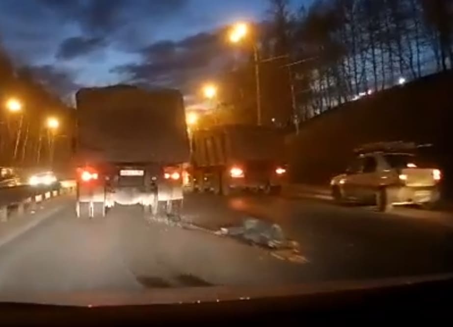 Drunk Dude Flattened Under Truck Wheels