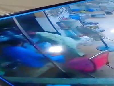 Shop Owner Takes a Bullet To The Head (Different Angles) 