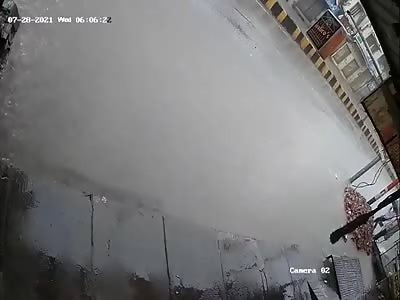 Umbrella Man Electrocuted During Flood