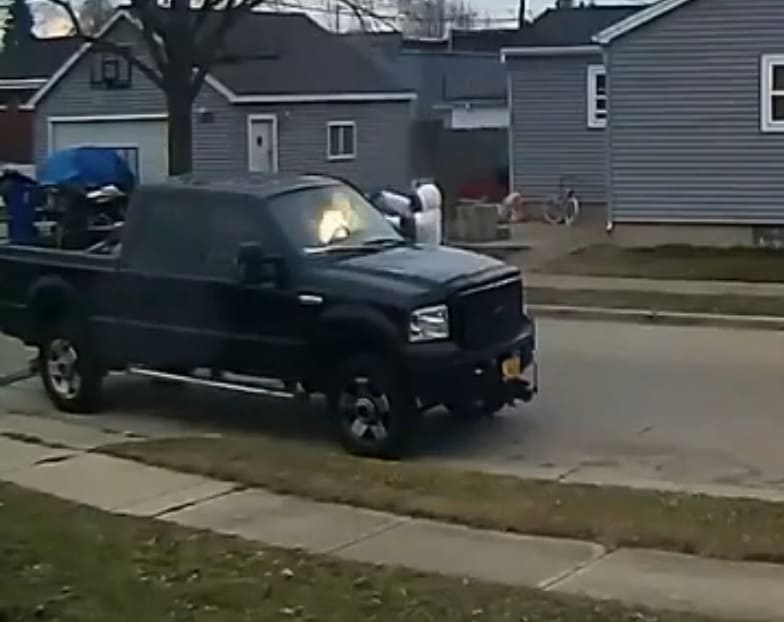 Guy Sitting In His Truck Filled With Lead