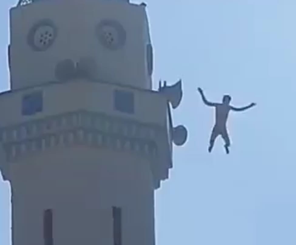 Dude Takes A Leap From The Top Of A Mosque