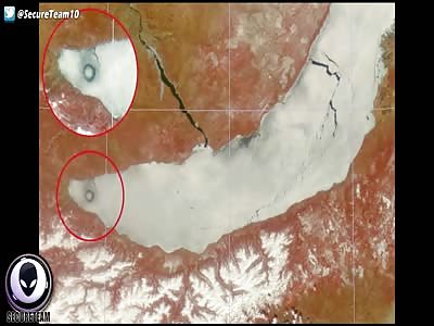 MYSTERY Ring On Siberian Lake Seen From Space Station