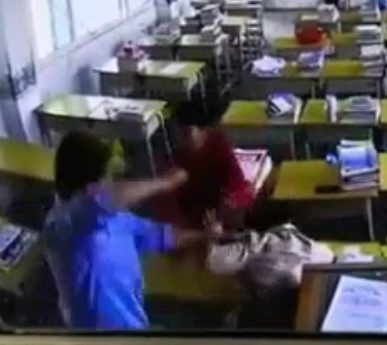 Female Teacher Beaten and kicked in Classroom 