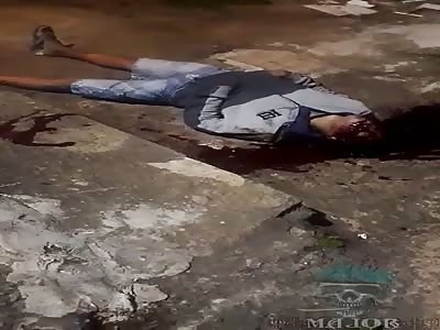 murdered man with headshots in Brazil