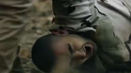 ISIS thug brutally executes a Syrian soldier in cold blood
