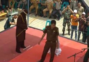 Sharia Law Patrols and Executions in Indonesia 