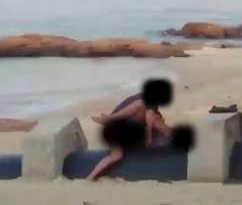 Public sex couple face jail after video caught them romping on beach in broad daylight
