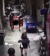 Husband Calmly Walks Down Street with his Wife's Decapitated Head