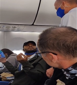 Dude Kicked off Plane For Pulling Mask Down to Eat.