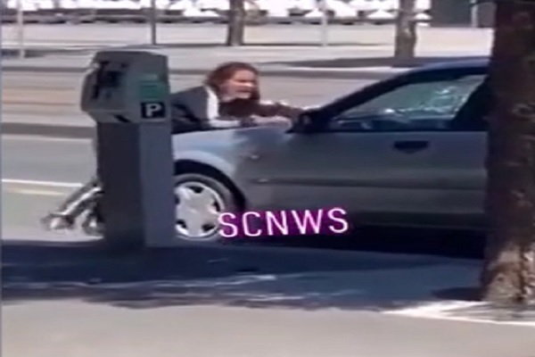 Possessed Woman Repeatedly Smashes Her Own Head Through a Car Windshield