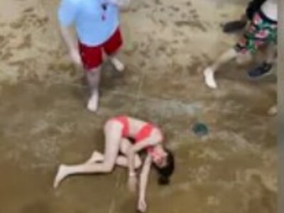Shock Video shows Beach Fight Black Kid Drops Bikini Girl on Her Head