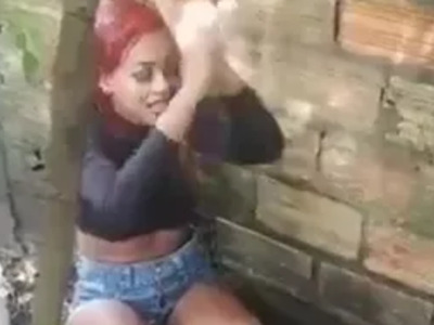 Pretty Redhead Bad Ass throws Gang Signs after her Fatal Bullet.....