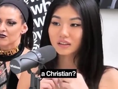 PORN STAR WEARING CRUCIFIX HAS AN ANSWER FOR US