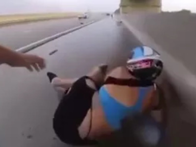 Flying Tire on the Highway Takes out Female Biker