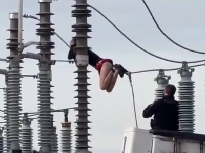 Crazy Woman Mad Trump Won Climbs Power Lines