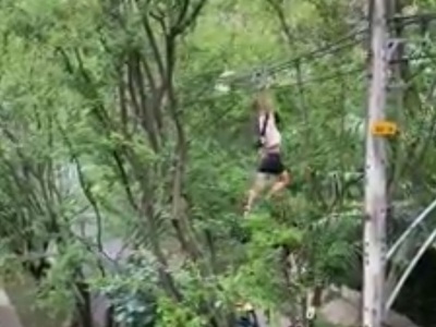 Girl Hanging from Wires Lands in the Worst Spot