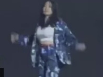 Girl puts on a Show on her Balcony