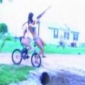 Two Cute Girls in Bikini's Riding a Bike with a Shotgun...... What Could Go Wrong?