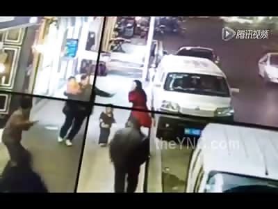 Crazy Lunatic Attacks Several People on the Street INCLUDING a Family with Two Small Children