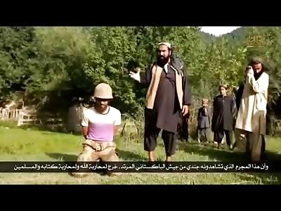 ISIS Beheads a Man in a Pink and Yellow Shirt and a ol Hat (Hacking Head Off with Machete)
