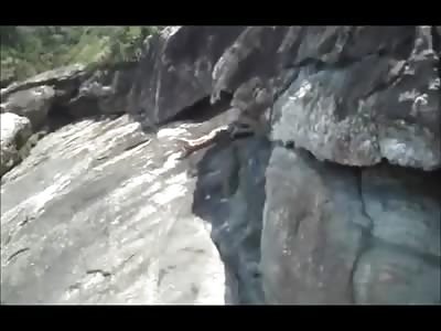Sneaky Man Records Couple Dry Humping on the Rocks 
