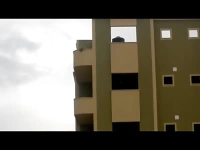 Incredible Dog Jumps Off a Building, Then Runs Off Like a Superhero Dog
