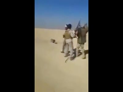 Blindfolded Young Boy is Shot to Death in the Desert by ISIS 