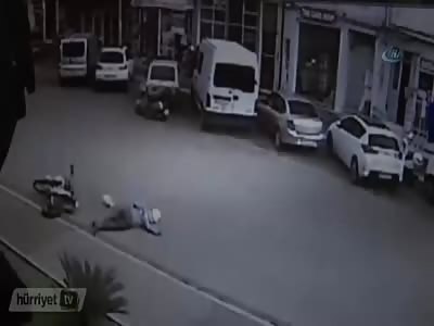 Rider Falls and is Killed by Truck
