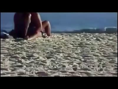 Couple having sex on the beach in front everyone ends interrupted by life guards