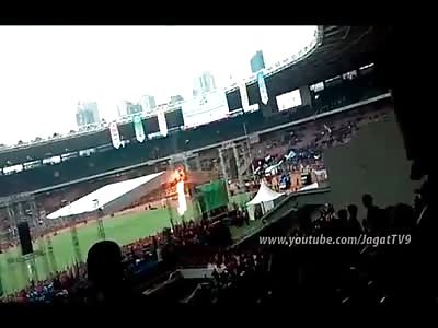 2 Angles of Man Setting Himself on Fire and Jumping From Stadium Upper Deck