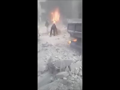 Man Mutilated and Burning Alive after Bombing on Civilians 