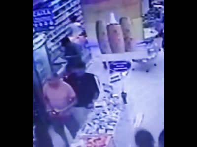 Mentally Ill Man Causing a Scene in a Drugstore is Knocked out by Man in Pink Shirt Who Had Enough