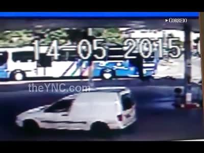 Woman on a Motorcycle Being crushed by Bus as Her Passenger Gets up and Attacks Bus Driver