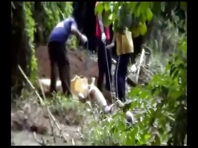 Woman's Corpse with Very Pointy Breasts is Pulled Out of River 