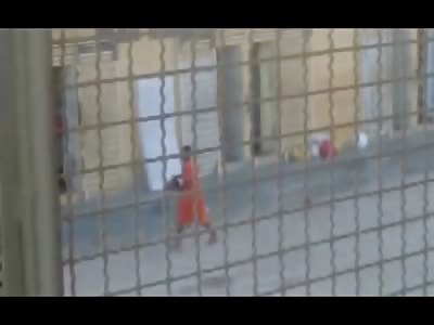 Footage from Brazilian Prison Riot shows Inmates Carrying Body Parts Across the Yard 