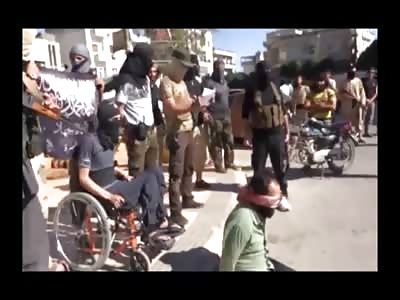 Wow This is a First...ISIS Executioner in Wheelchair Delivers Fatal Bullet through the Victims Brain 