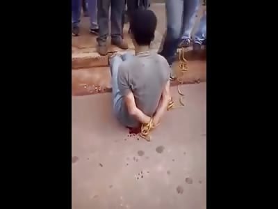 Tied up Thief Receives Unrelenting Street Justice