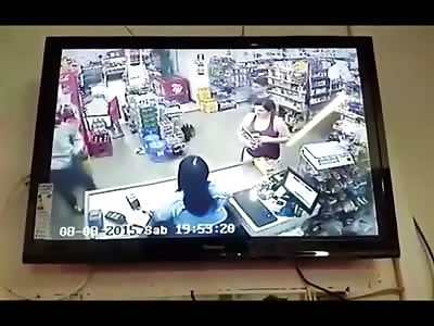 Store Owner Not Only gets Robbed but He also Gets a Brutal Kick to the Face on the Way out 