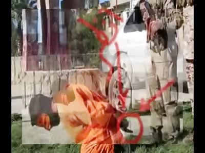 ISIS Executes Prisoner Publicly But What is He Doing With His Hands (Sign Language?)