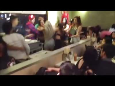 Hilarious: Teen Girl gets a Glass Dish Smashed over her Face during Brawl in Restaurant 