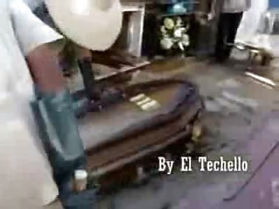 Bizarre Video of Men Exhuming an Old Corpse and Stealing it from Coffin