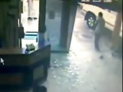 Idiot Arabic Driver Crashes SUV Through Store Running over Two Men