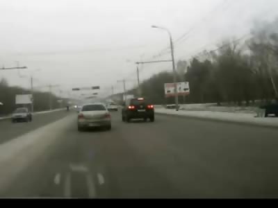 Dumbest Pedestrian on Earth Gets Killed Crossing a Snowy Highway