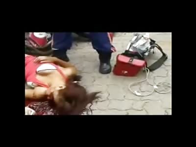 Pretty Female Lying in the Street: EMT attempt to Shock her Heart to Keep her Alive