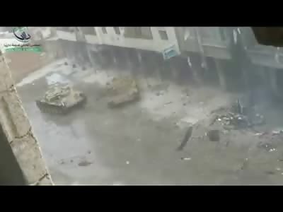 Syrian Man looks Death in the Face as Tank Fires at his Building