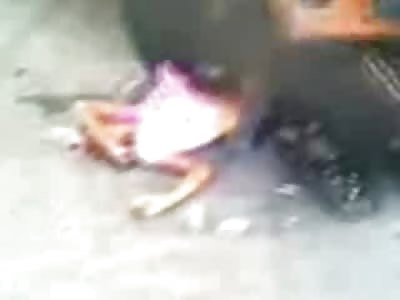 Hemmed Up Girl in Pink Shirt Stuck under a Truck, Friend Died as Well