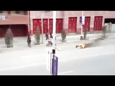 Meanwhile in Tibet...Monk Burns alive as Car Pass By