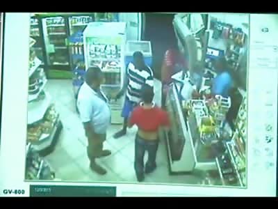 Priest Shot in the Face in a Brazilian Corner Store trying to Run after Robber (Green Shirt) 